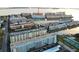 Breathtaking aerial view of waterfront condos, situated on a serene bay, offering convenient boat access at 5925 Shore S Blvd # 608, Gulfport, FL 33707