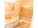 Bathroom featuring tile floors and a shower/tub combo with sliding doors at 5925 Shore S Blvd # 608, Gulfport, FL 33707