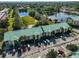Aerial view of community buildings, lush landscaping, and ample parking at 6123 113Th St # 510, Seminole, FL 33772