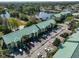 Aerial view of condos with manicured landscaping and ample parking at 6123 113Th St # 510, Seminole, FL 33772
