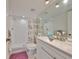 Bathroom with granite countertops, modern fixtures, and a spacious walk-in shower at 6123 113Th St # 510, Seminole, FL 33772