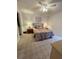Cozy bedroom featuring patterned bedding and a mirrored closet door at 6123 113Th St # 510, Seminole, FL 33772