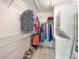 Walk-in closet with shelving for clothing storage and stackable washer/dryer units at 6123 113Th St # 510, Seminole, FL 33772