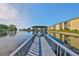 Lakeside gazebo with community building views on a sunny day at 6123 113Th St # 510, Seminole, FL 33772