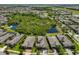 An aerial view of a neighborhood shows the home's proximity to natural green spaces at 6907 Crestpoint Dr, Apollo Beach, FL 33572