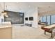 Club room featuring chalkboard wall, TV's, and a shuffleboard table at 6907 Crestpoint Dr, Apollo Beach, FL 33572