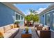 Spacious outdoor patio with seating area, perfect for relaxing and entertaining at 6907 Crestpoint Dr, Apollo Beach, FL 33572