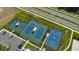 Aerial view of community tennis and basketball courts at 6907 Crestpoint Dr, Apollo Beach, FL 33572