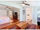 Open room showing the bedroom and sitting area, featuring hardwood floors and modern amenities at 714 W Peninsular St, Tampa, FL 33603