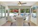 Cozy dining area bathed in natural light, overlooking the backyard and patio at 731 44Th Ne Ave, St Petersburg, FL 33703