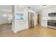 Well-designed kitchen with stainless steel appliances, white cabinets, and a functional layout at 731 44Th Ne Ave, St Petersburg, FL 33703