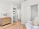 Relaxing bedroom featuring light wood floors, ample closet space, and bright natural light at 747 39Th Ne Ave, St Petersburg, FL 33703