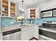 Lovely kitchen featuring sleek stainless steel appliances, attractive cabinetry, and modern countertops at 747 39Th Ne Ave, St Petersburg, FL 33703