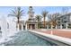 Beautiful community fountain with palm trees and clock tower at the Avalon at the Pine Ridge community at 9905 Woodbay Dr, Tampa, FL 33626