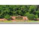 The Westchase community entrance sign with manicured landscaping and tree-lined streets, Tampa, FL at 9905 Woodbay Dr, Tampa, FL 33626