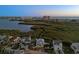 Stunning aerial shot of the house near a beautiful bay, highlighting the coastal lifestyle at 13936 Harbor View Dr, Seminole, FL 33776