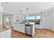 Bright, open kitchen with stainless steel appliances and a beautiful view at 13936 Harbor View Dr, Seminole, FL 33776
