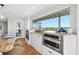 Modern kitchen with built-in stainless steel appliances and a sunny window view at 13936 Harbor View Dr, Seminole, FL 33776