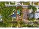 Aerial view showcasing the property, pool, and spacious yard at 2925 W Alline Ave, Tampa, FL 33611