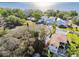 Lovely neighborhood featuring well-maintained homes, mature trees, and glimpses of the sparkling waterfront at 1045 Jesse Ave, Safety Harbor, FL 34695