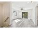 Bonus room with wood-look floors, recessed lighting, and access to outdoor balcony at 1045 Jesse Ave, Safety Harbor, FL 34695