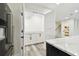 Butler's pantry with white marble countertops and custom cabinets at 1045 Jesse Ave, Safety Harbor, FL 34695