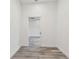 Hallway with gray wood flooring at 1045 Jesse Ave, Safety Harbor, FL 34695