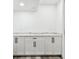 Pantry with white cabinets and marble countertops at 1045 Jesse Ave, Safety Harbor, FL 34695
