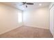 Bedroom features a neutral color scheme, carpet flooring, a window, and closet with sliding doors at 10943 Verawood Dr, Riverview, FL 33579