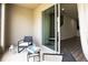 Relaxing outdoor patio with comfortable seating and view to the living area at 10943 Verawood Dr, Riverview, FL 33579