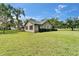 Well-maintained home exterior with stone accents and a large yard, perfect for outdoor activities and relaxation at 1204 Joe Henry Wheeler Dr, Dover, FL 33527