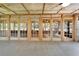 Large porch with paneled doors and windows offering panoramic views and seamless indoor/outdoor living at 1204 Joe Henry Wheeler Dr, Dover, FL 33527