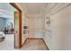 Functional walk-in closet with wire shelving and carpet providing ample storage and organization options at 1204 Joe Henry Wheeler Dr, Dover, FL 33527