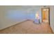 Bedroom featuring carpet flooring, a closet with white sliding doors, and a nightstand with a lamp at 12300 Park Blvd # 202, Seminole, FL 33772