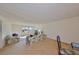Bright and airy living room with large windows and comfortable seating arrangement at 12300 Park Blvd # 202, Seminole, FL 33772
