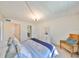 Spacious bedroom offers ample room, comfortable bedding, and access to the en-suite bathroom at 12300 Park Blvd # 202, Seminole, FL 33772