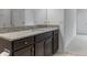 Bathroom featuring a granite vanity and modern fixtures for a clean, updated look at 12308 Chaya Ct, Spring Hill, FL 34610