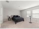Bedroom featuring plush carpeting and natural lighting at 12856 French Market Dr, Riverview, FL 33579