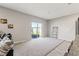 Bright open living space with sliding glass doors and vinyl floors extending from the kitchen at 12856 French Market Dr, Riverview, FL 33579