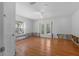 Bright and airy bedroom with hardwood floors and French doors opening to the outdoor space at 1344 Monterey Ne Blvd, St Petersburg, FL 33704
