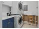 Laundry room area with stackable washer and dryer at 1344 Monterey Ne Blvd, St Petersburg, FL 33704