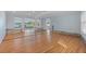 Bright living room with hardwood floors, large windows and water views at 1344 Monterey Ne Blvd, St Petersburg, FL 33704