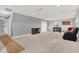 Large bonus room featuring neutral carpeting and plenty of open space for entertaining or relaxing at 18185 Cortes Creek Blvd, Spring Hill, FL 34610