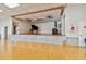 Large community hall with a stage and piano, perfect for performances and events at 1900 59Th N Ave # 108, St Petersburg, FL 33714