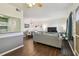 Open-concept living room with modern furniture, dining area, and kitchen view, ideal for relaxation at 1900 59Th N Ave # 108, St Petersburg, FL 33714