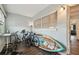 Storage space featuring bikes, a paddle board, and natural light from the window at 1900 59Th N Ave # 108, St Petersburg, FL 33714