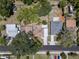 Aerial view of the home showcasing the neighborhood and property at 1906 E Idlewild Ave, Tampa, FL 33610