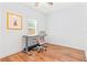 Bright home office featuring hardwood floors and natural light at 1906 E Idlewild Ave, Tampa, FL 33610