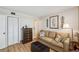 Inviting living room featuring neutral tones, comfortable seating, and wood-style flooring at 19701 Gulf Blvd # 210, Indian Shores, FL 33785