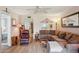 Cozy living room with plush sofa, recliner, and view into other rooms at 19701 Gulf Blvd # 210, Indian Shores, FL 33785